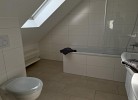 Badezimmer mit Badewanne oben