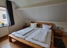 Schlafzimmer mit Doppelbett