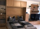 Wohnzimmerschran mit Klappbett